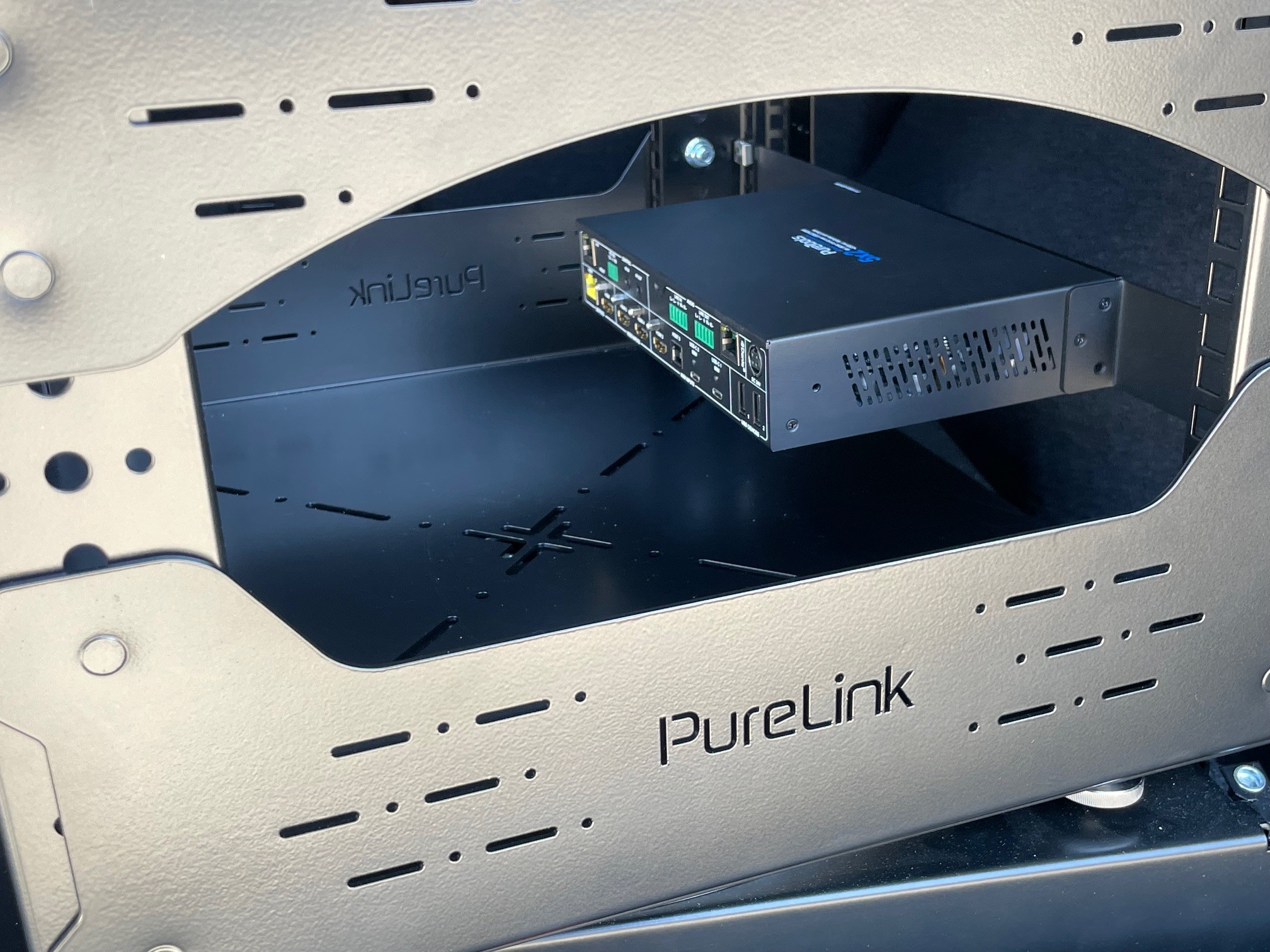 PureLink branded rack shelf with mounted equipment